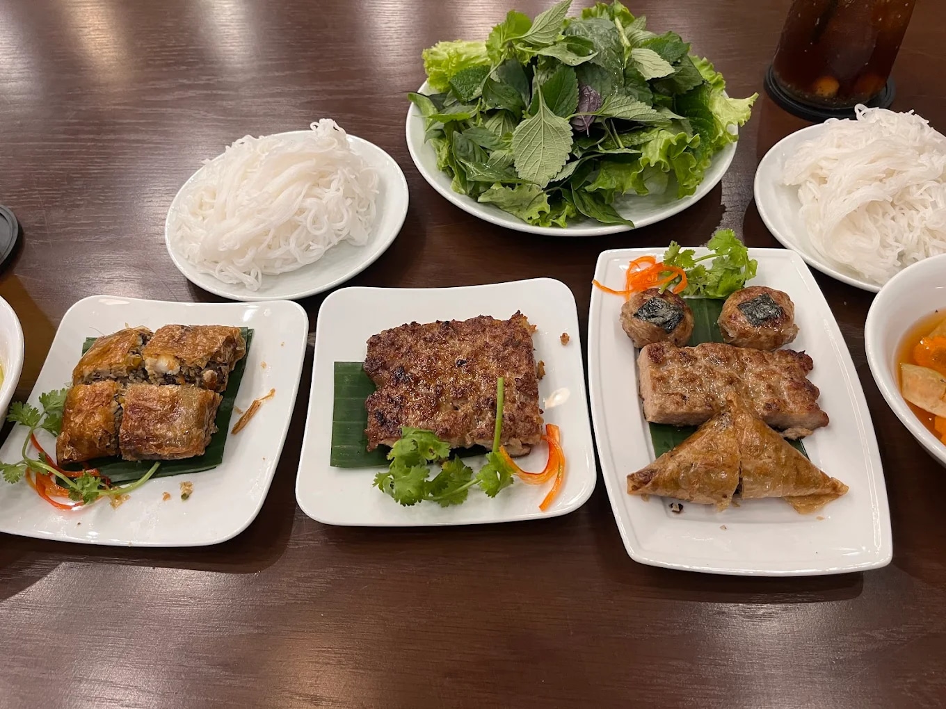 The pork is finely ground, shaped into squares, and grilled evenly over charcoal for a unique touch
